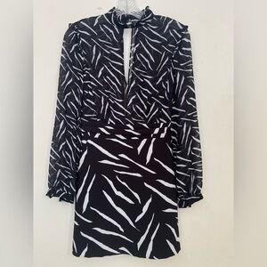 bebe Black and White Long Sleeve Pleated Sheer Dress